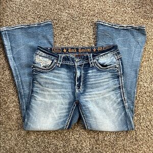 Rock Revival Faded Light Blue Flare Jeans with Embroidered Pockets